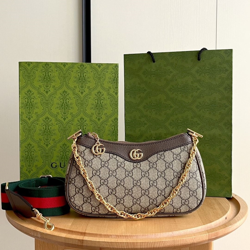 G*u*i top handle bags